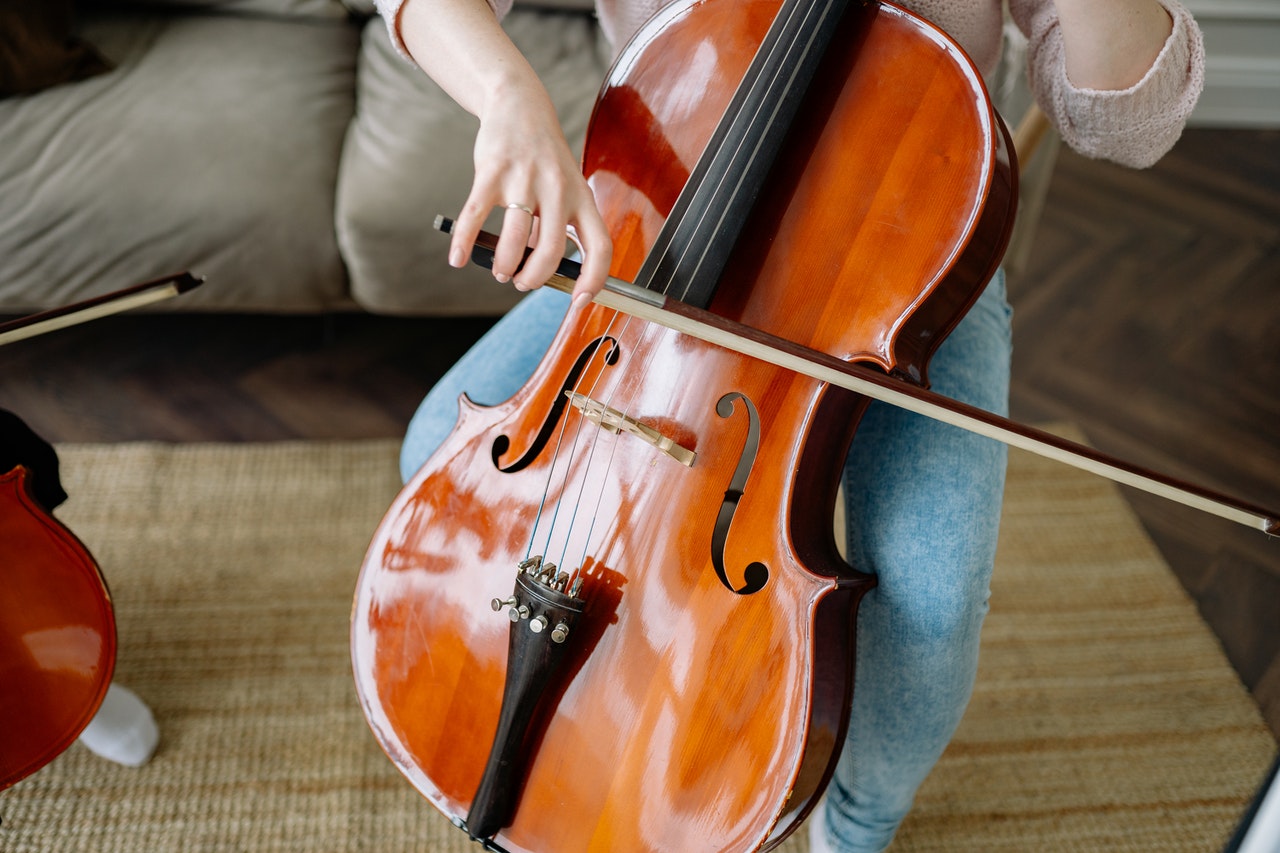 woman playing on cello