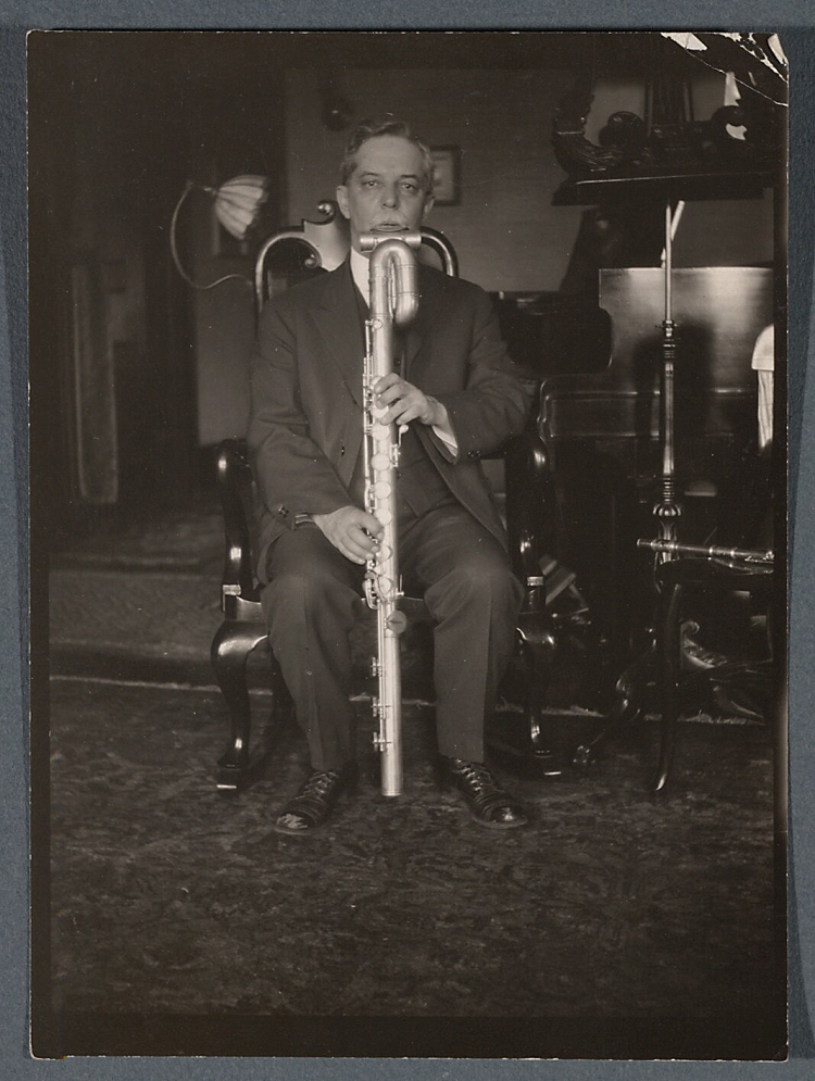 Dayton Miller playing an albisiphone, 1920s